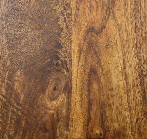 Close-up of a wooden surface with visible grain and texture