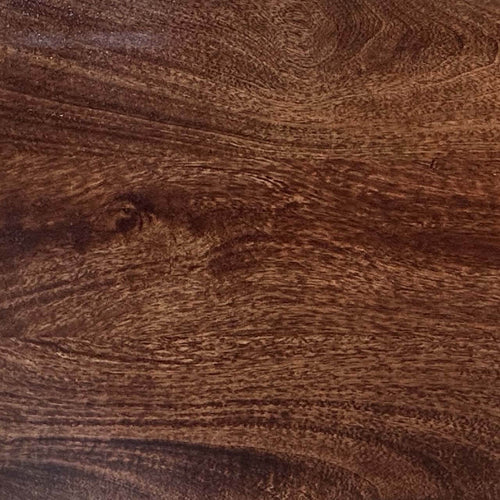 Close-up of a wooden surface with a rich brown color and visible grain.