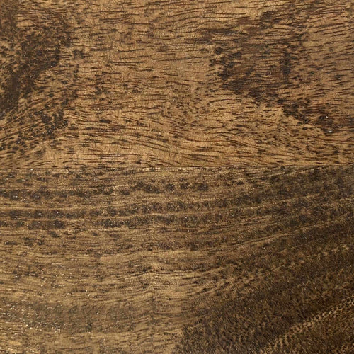 Close-up of a wooden surface with a brown and beige color pattern