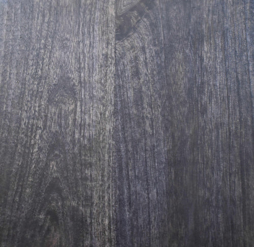 Close-up of dark wood texture with visible grain
