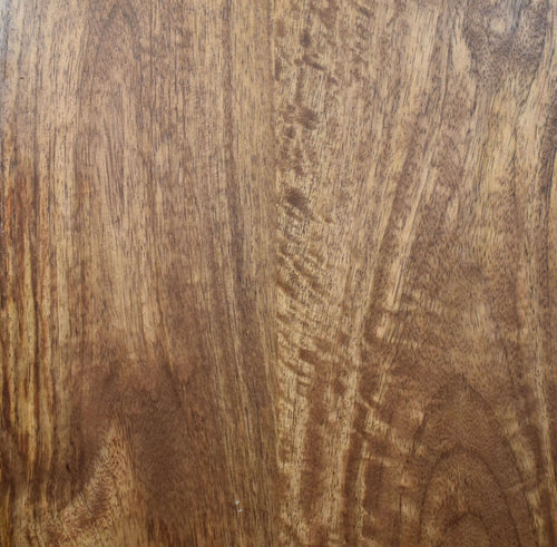 Close-up of a wooden surface with a brown and beige color pattern