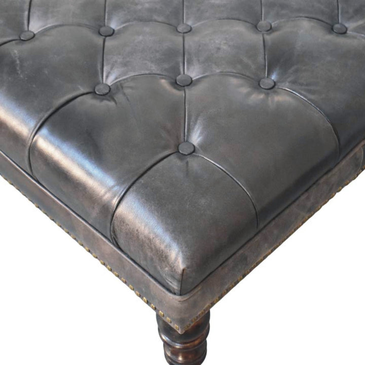 Black Leather Upholstered Ottoman in Solid Mango Wood - product view 4 showing handcrafted solid mango wood stool