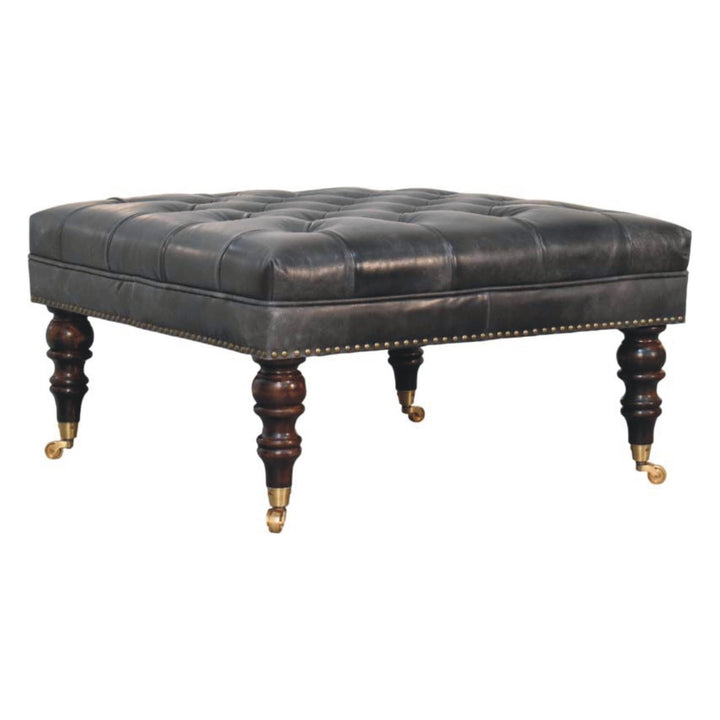 Black Leather Upholstered Ottoman in Solid Mango Wood - main view showing handcrafted solid mango wood stool