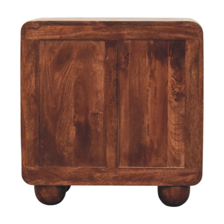 3-Drawer rounded mango wood nightstand in winewood oak finish, showcasing solid craftsmanship and spacious storage.