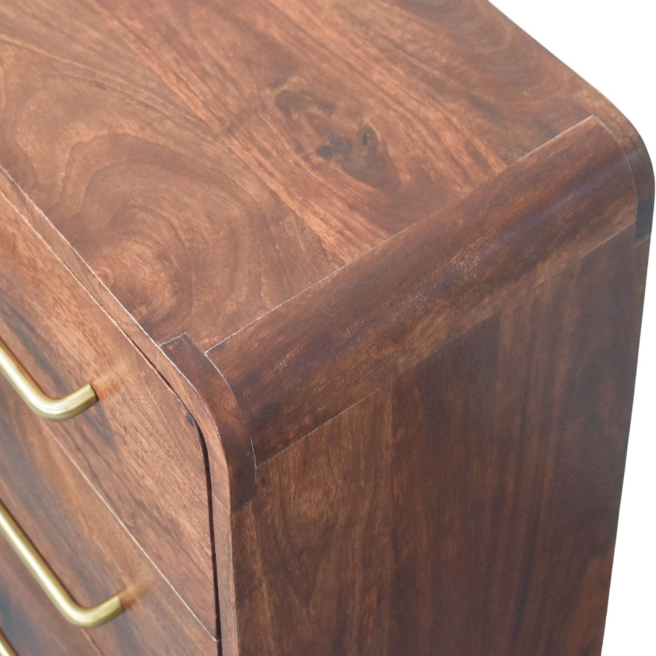 Top view of a 3-drawer mango wood nightstand showcasing its smooth finish and rounded edges.