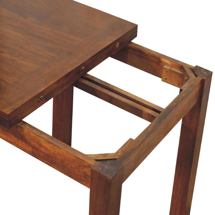Chestnut Butterfly Dining Table - Solid Mango Wood Kitchen Table with extension mechanism on display