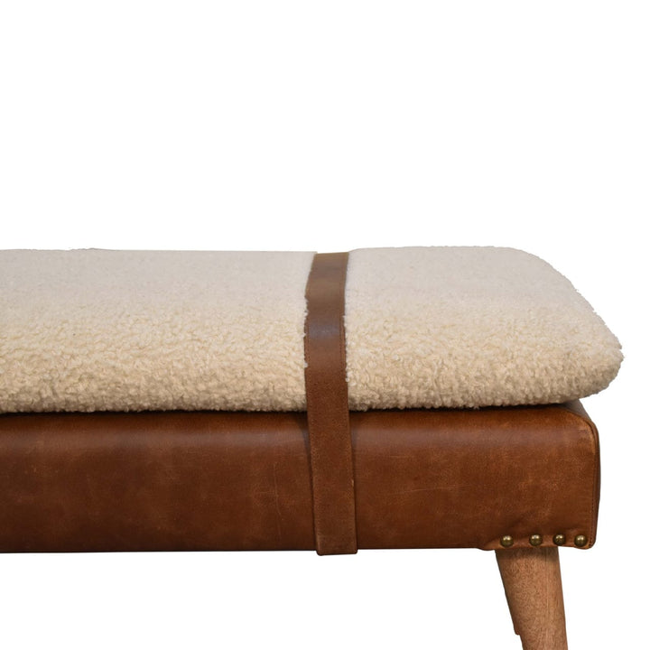 Handcrafted mango wood bench with boucle buffalo hide leather and soft cream cushion for stylish entryway seating.