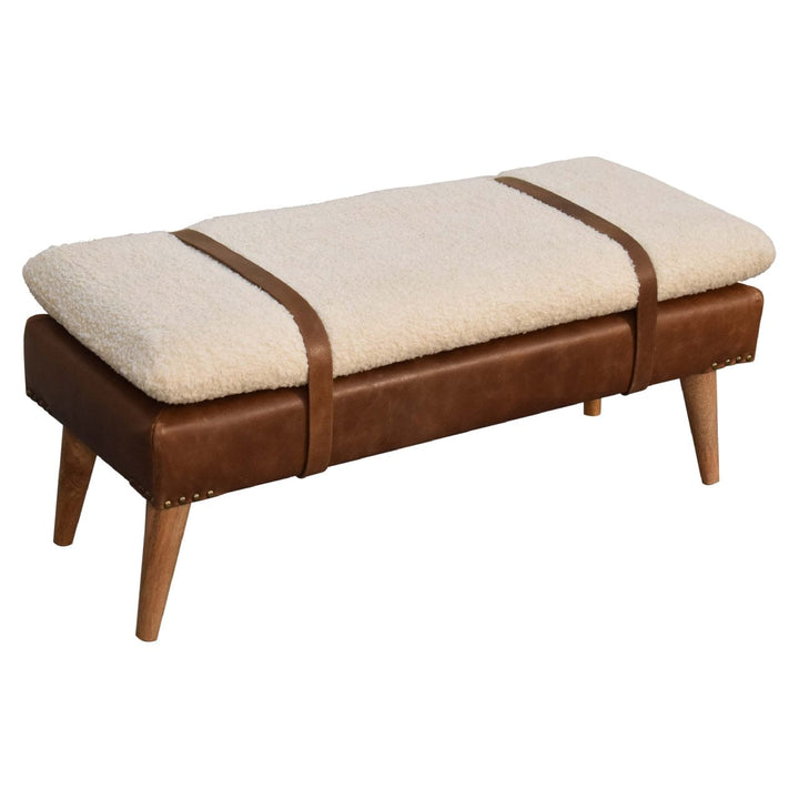 Handcrafted mango wood bench featuring boucle buffalo hide leather and solid legs, ideal for entryway or bedroom use.