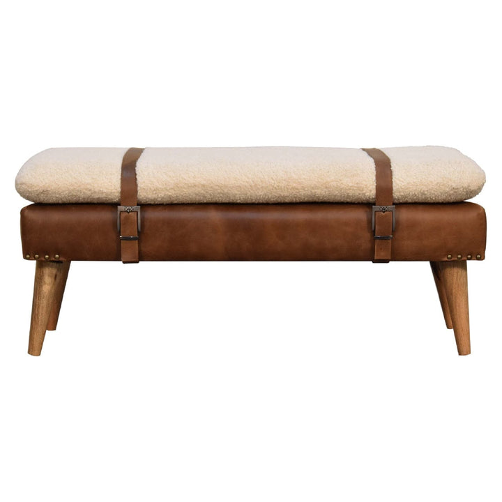 Stylish handcrafted mango wood bench with soft cushion and leather straps for comfortable seating in entryway or living space.