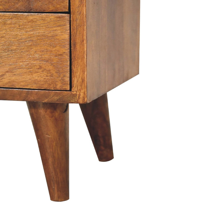 Solid mango wood nightstand leg and drawer detail, showcasing craftsmanship and modern design for bedrooms.