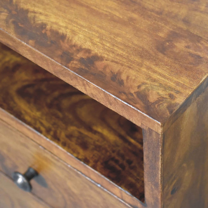 Close-up of the solid mango wood nightstand showcasing its rich grain and smooth finish.