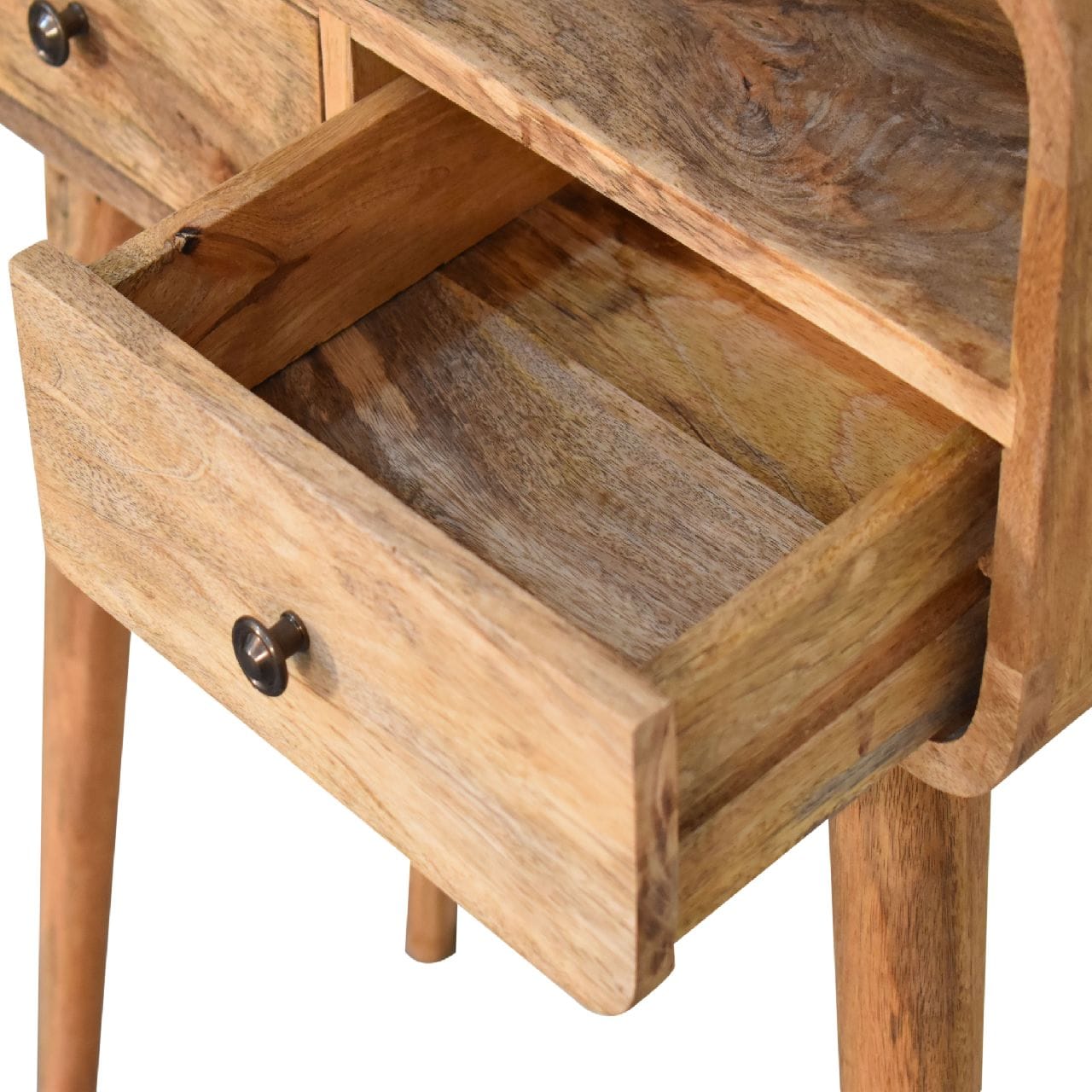 Open drawer of a mango wood entryway console table showcasing its natural finish and craftsmanship.