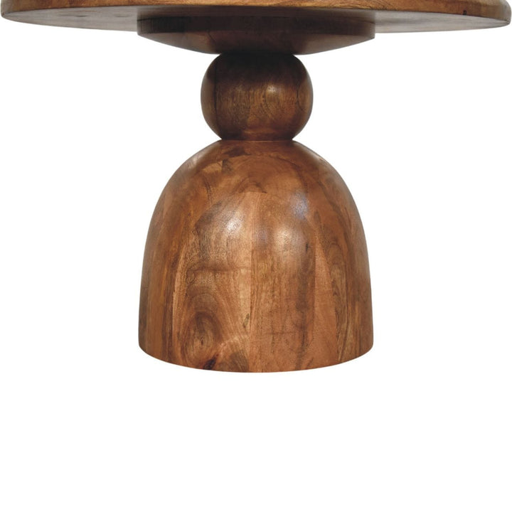 Sculpted Pedestal Coffee Table in Solid Mango Wood - product view 3 showing handcrafted solid mango wood coffee table