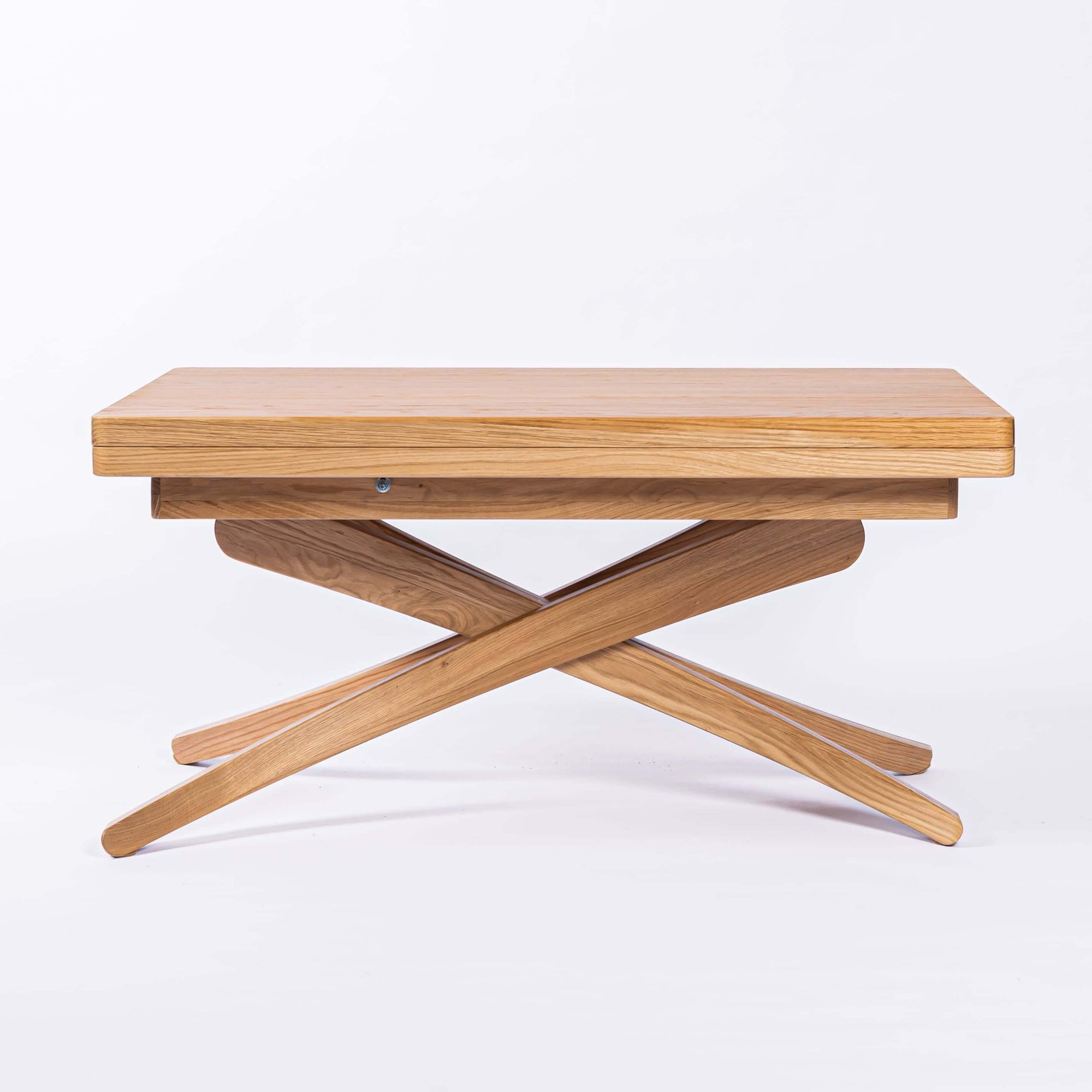 Solid oak wood adjustable height extendable dining table with a unique lift top design.